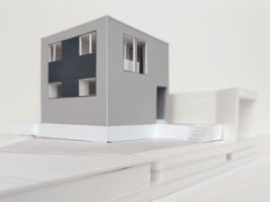 愛知の分譲敷地に建つ北側に開く階段吹抜けから南側採光の家