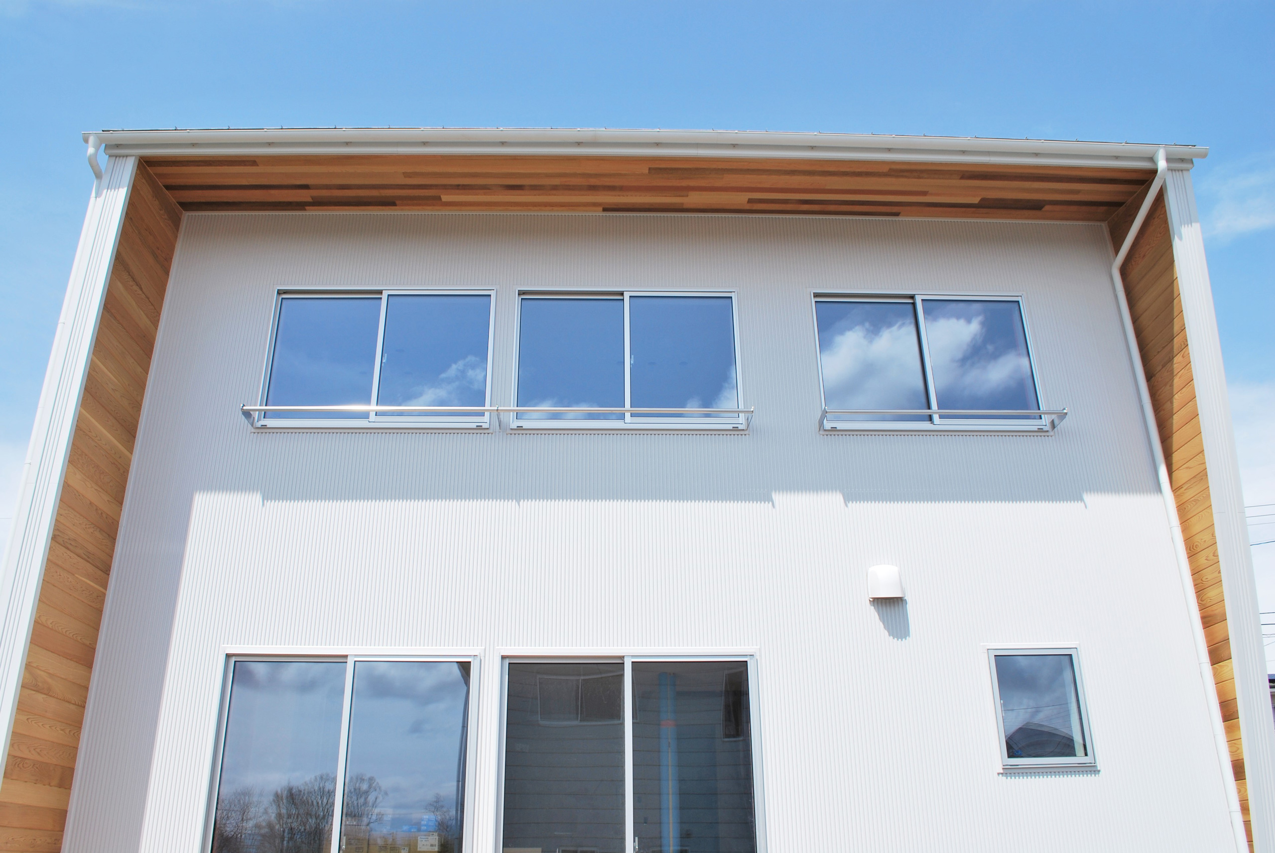 Wood siding and eaves