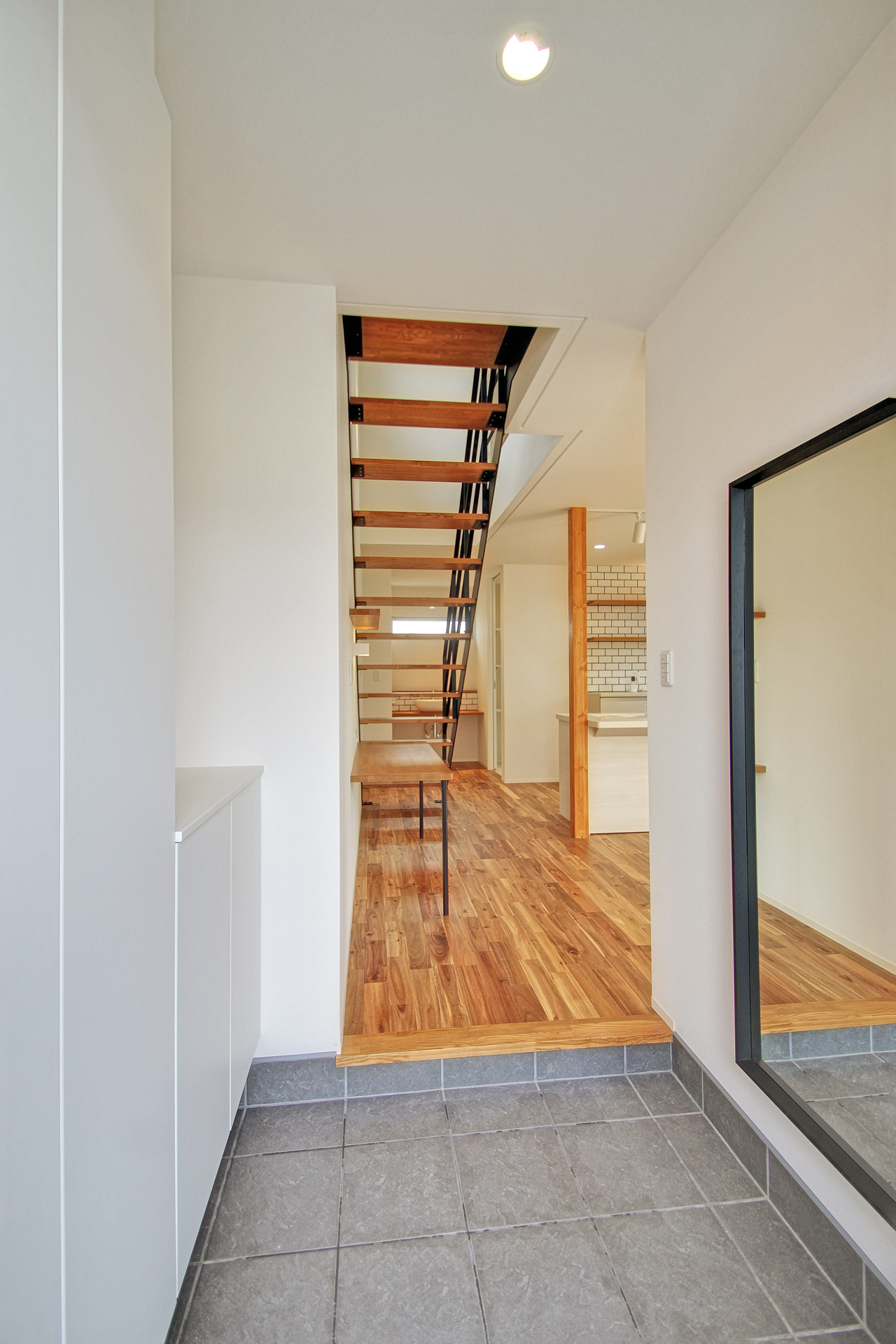 Entrance with full-length mirror