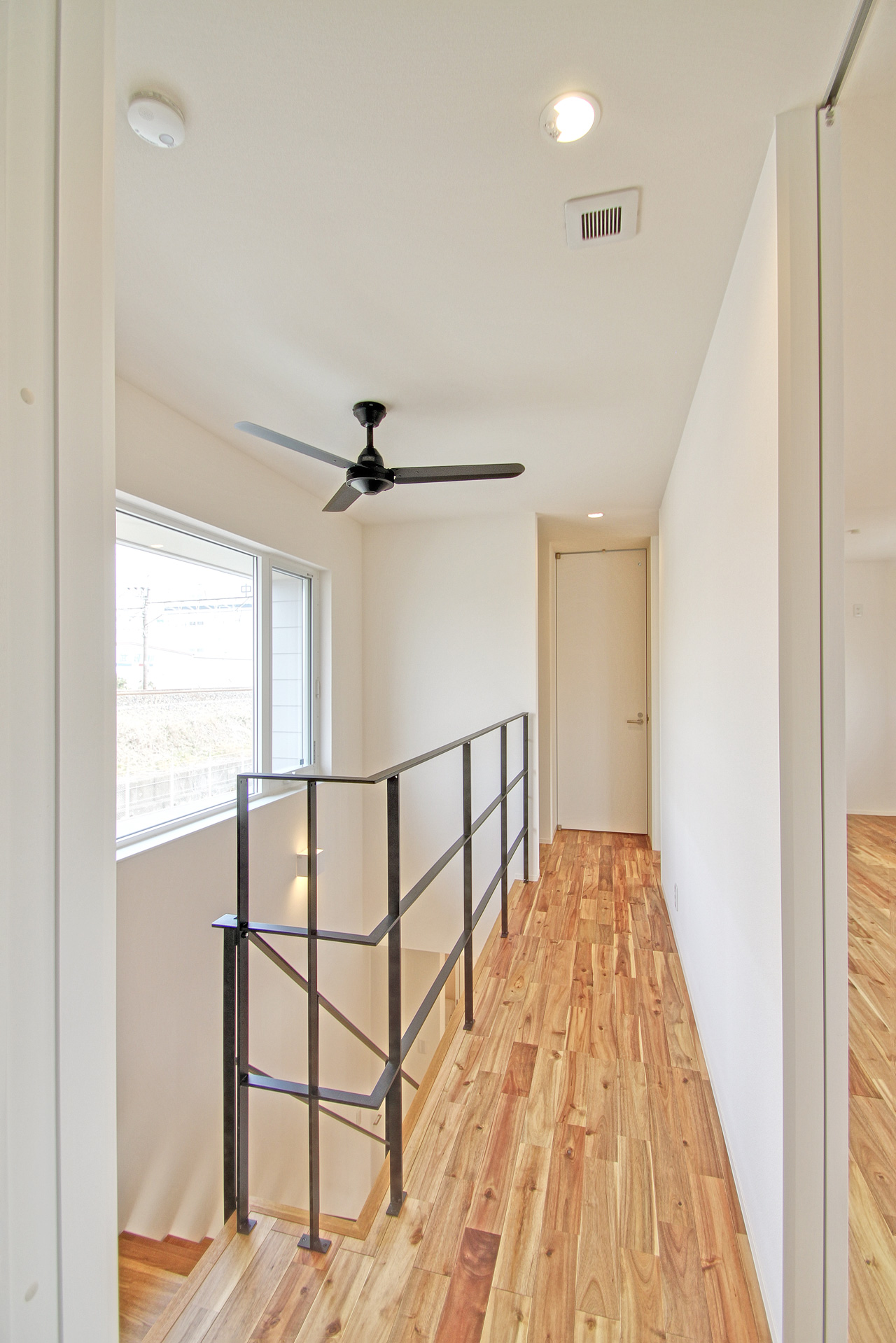 Ceiling fan above void